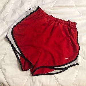 red Nike shorts
